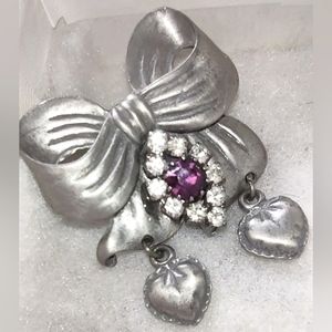 Stamped LCD Pewter Bow Pin from 2006